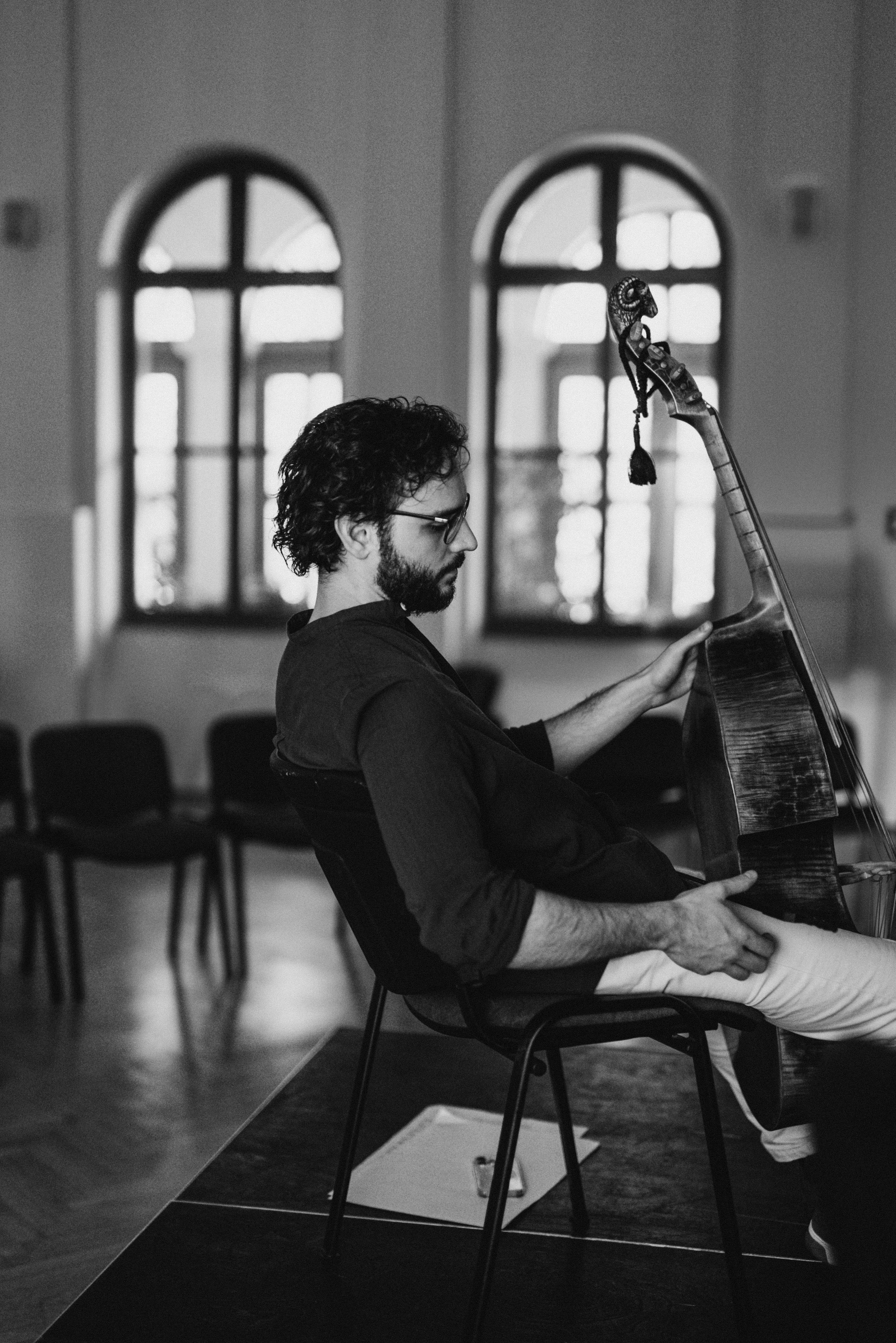 Musician with viola da gamba during rehearsal for The Bridge Cantata
