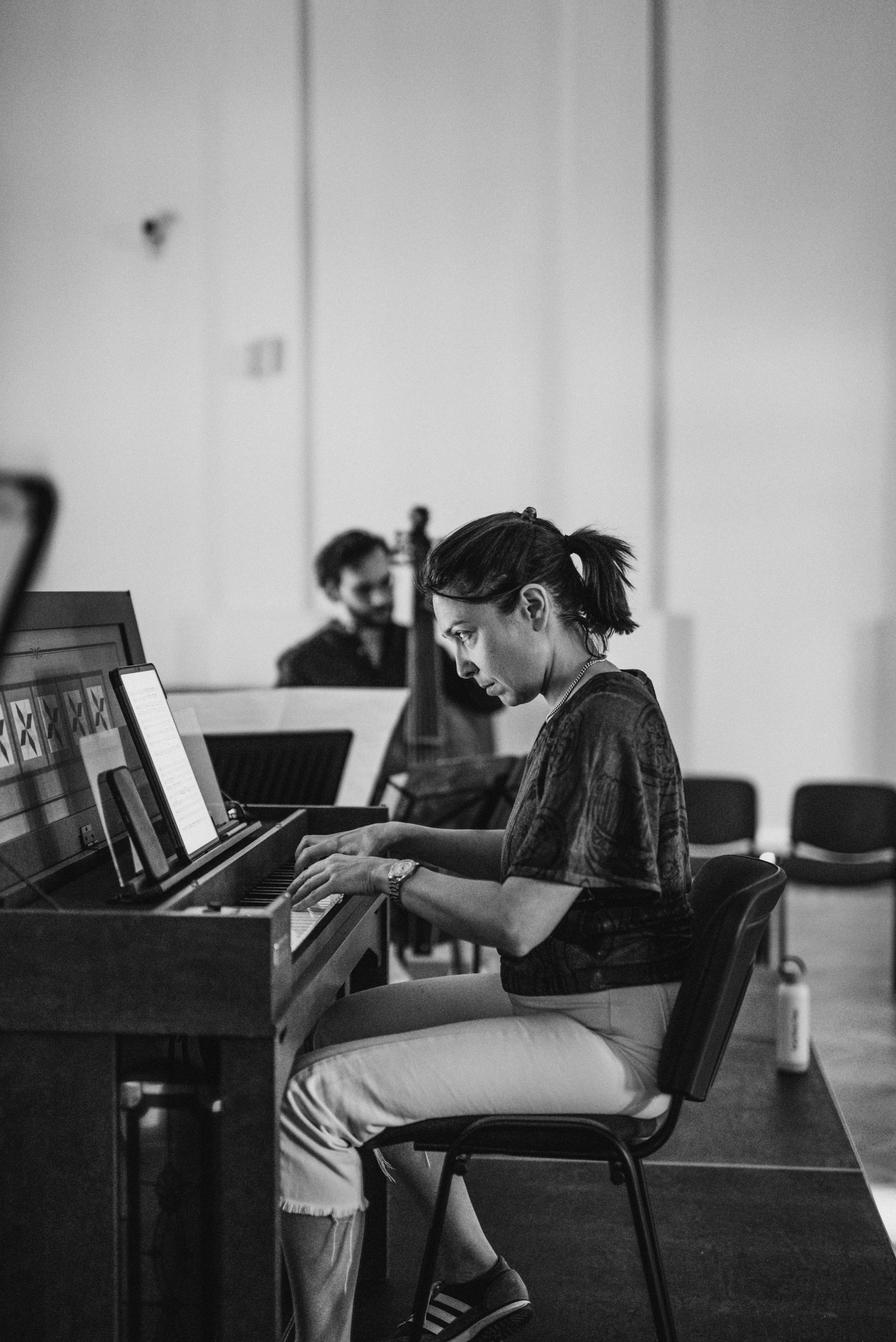 Keyboard player during rehearsal for The Bridge Cantata